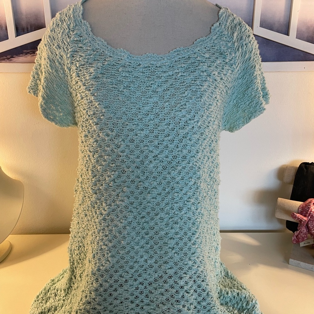 Anthropologie, “Knitted and knotted” sweater.
